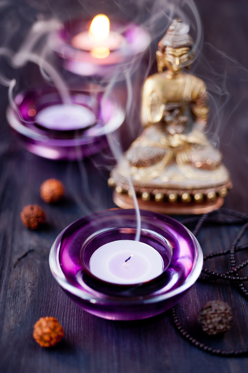 Buddha Statue and Candle