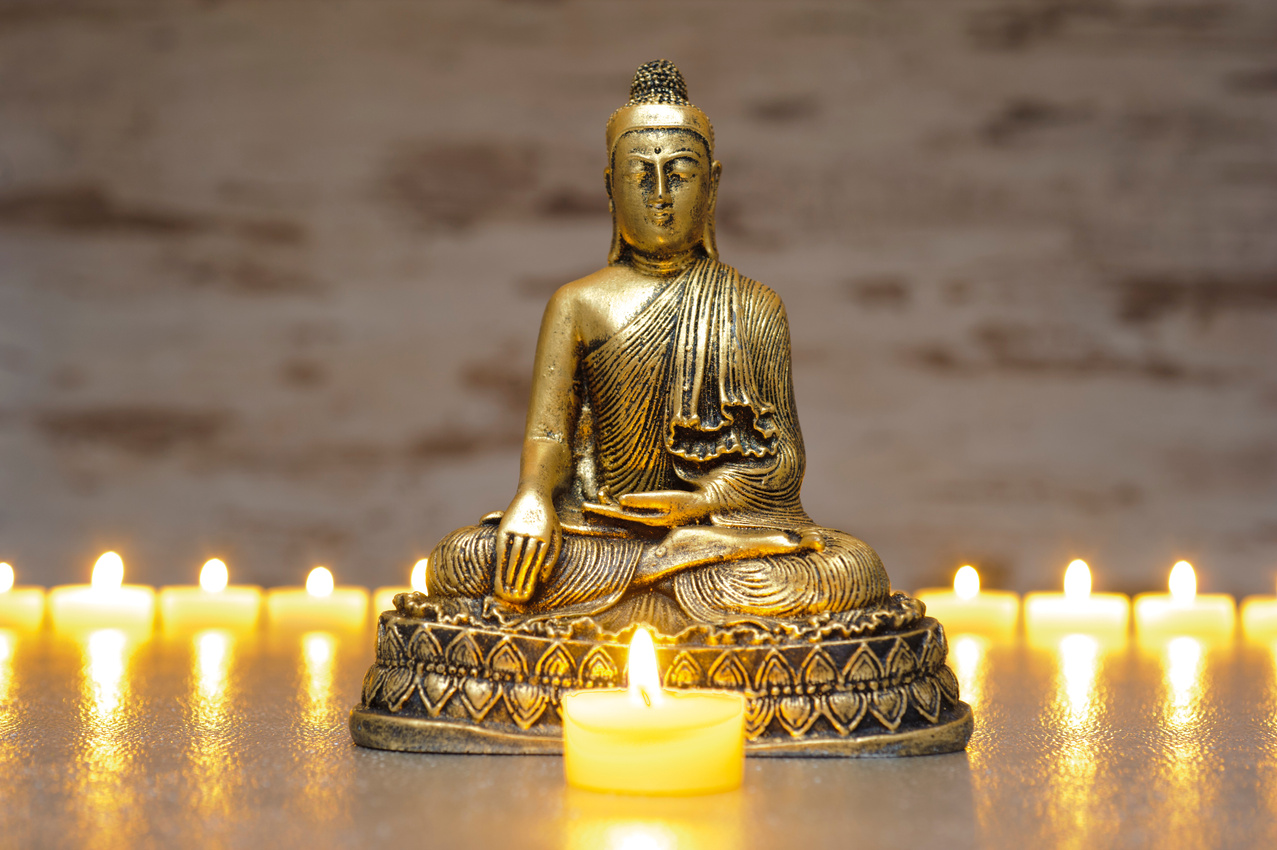 Buddha with candle lights